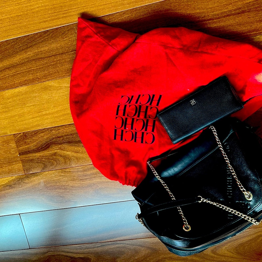 Used Carolina Herrera handbag with a wallet